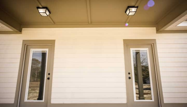 We offer siding services in Glen Allen, Virginia. Hardie plank siding installation in a front entry way.